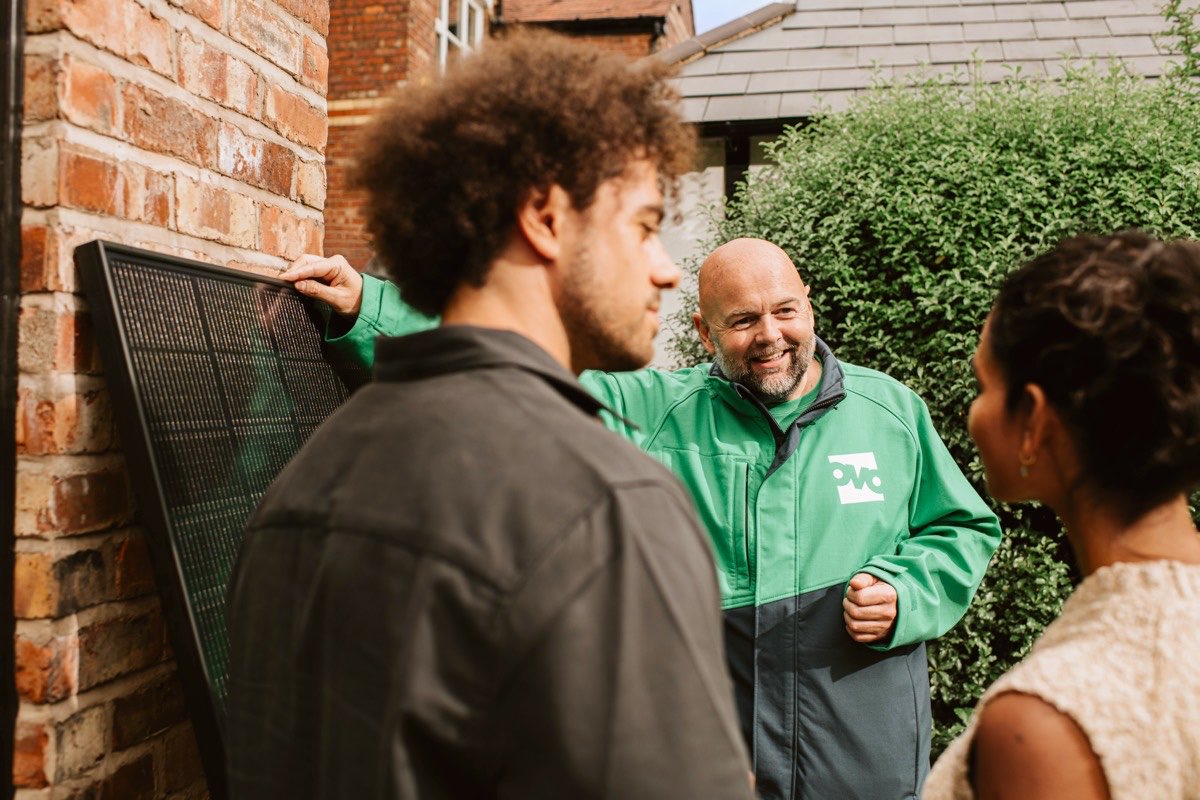 A solar panel being shown to homeowners